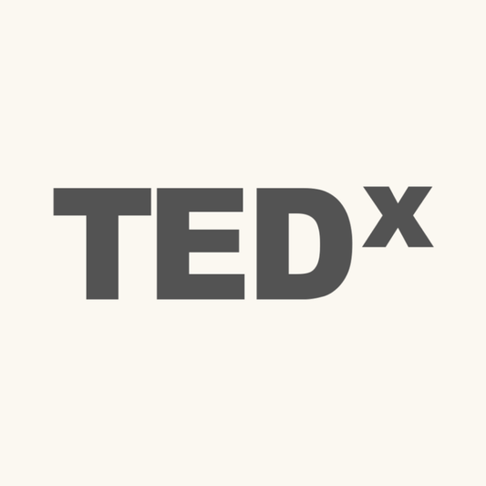 TEDx logo on a white background